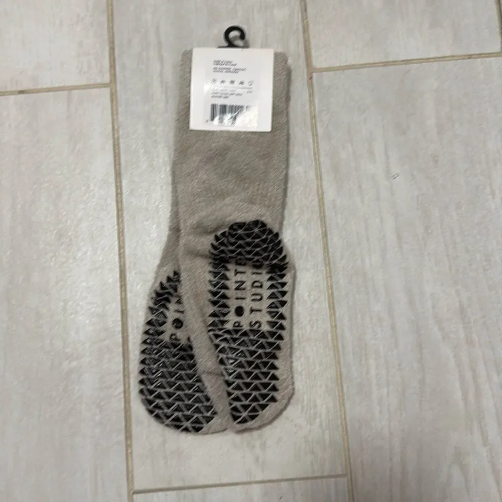 NWT fuzzy smiley pointe studio grip socks. Size small